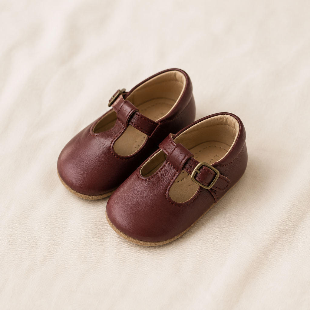 Burgundy leather Mary Jane baby shoes with adjustable buckle